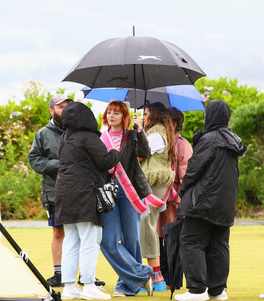 More pics of the making of the comedy series Dinosaur. Actresses, crew and local extras and a bit of rain.