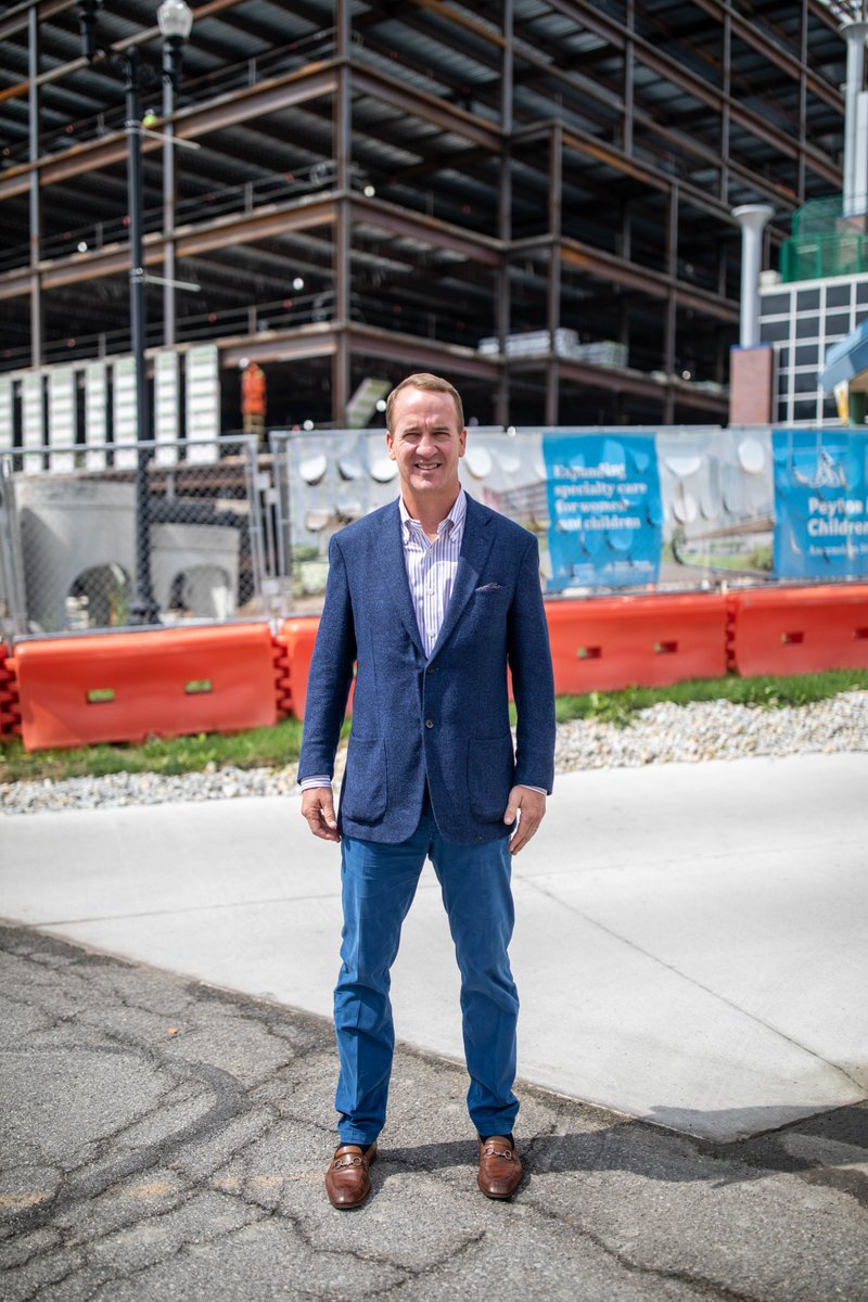 PeytonChildrens's tweet photo. Peyton Manning joined guests in celebrating a milestone of the construction of the new Women and Children’s Tower at Ascension St. Vincent. One of the final beams that will “top” the tower was on display at Peyton Manning Children’s Hospital for signatures ahead of its placement. https://t.co/nQuzbDfTCl