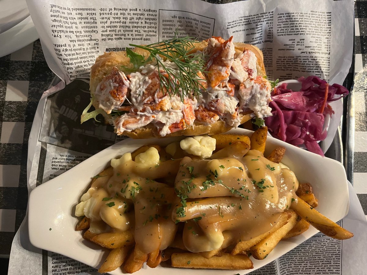 It’s #foodiefriday in #fredericton #newbrunswick and we’re at #claudineseatery. Jim had fried clams and I had a #lobsterroll with #poutine. (Had to try the poutine. We’re in Canada after all.)

#fredtourism #destinationnb #explorenb #NB #travelwritersuniversity #ifwtwa1 @ifwtwa1