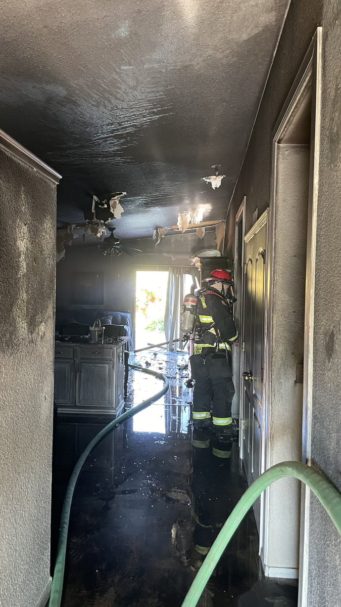TMFPD's tweet photo. Shortly after 7am, TMFR Firefighters made an interior attack and knocked down a structure fire in Cold Springs on Papa Bear Cir. Crews are now completing overhaul. Fire contained to two rooms. Sole resident escaped with no injuries and will be displaced. Fire under investigation. https://t.co/KSJqYibqK5