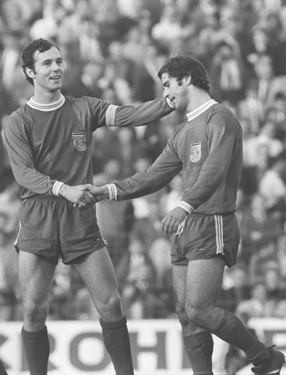 Bayern's Franz Beckenbauer and Gerd Müller celebrate Müller’s goal against Werder Bremen in the Bundesliga, on 4 October 1969. Bayern won the match 4-1. 

Photo: Sven Simon