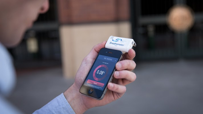 The breathometer device attached to a phone