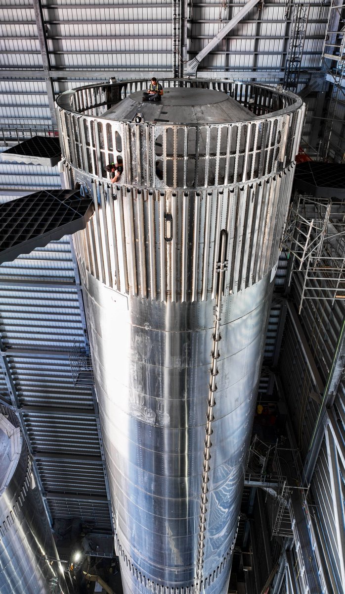 Vented interstage and heat shield installed atop Booster 9. Starship and Super Heavy are being upgraded to use a separation method called hot-staging, where Starship’s second stage engines will ignite to push the ship away from the booster