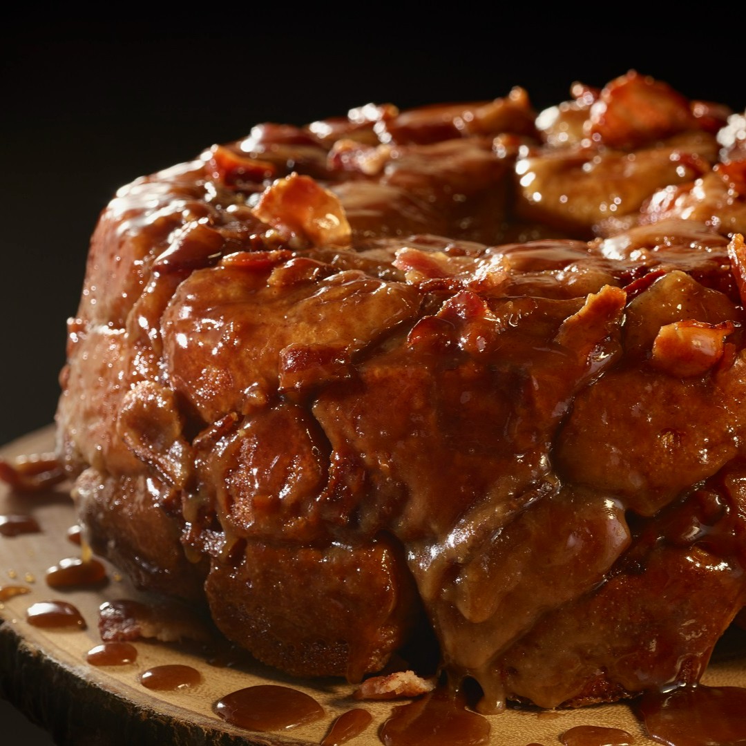 We've added the savory crispiness of bacon to some sweet and fluffy favorite for the ultimate breakfast treat, like this delicious maple bacon monkey bread. bit.ly/3QuIGUB