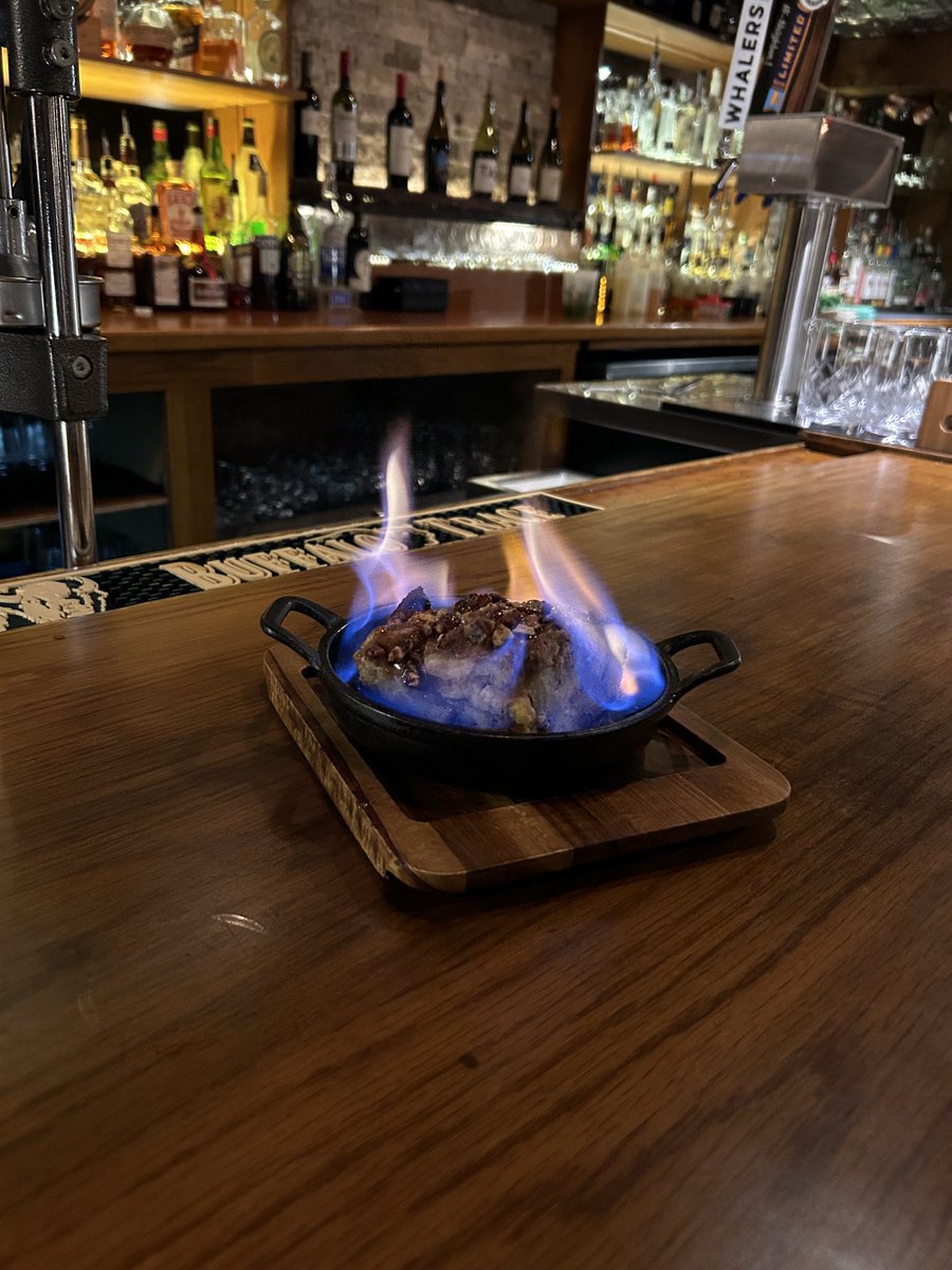 Drummaiden's tweet image. Okay.  Went completely decadent.  Baba fosters bread pudding and an espresso. I’m not going to be able to eat for a week! #flambe