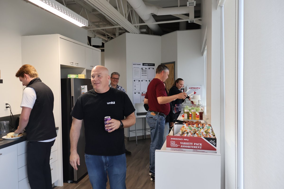 Unitiicorp's tweet photo. A great end to our week and a successful employee BBQ hosted by the unitii Social Committee! Calgary employees got to share a great meal at the Calgary Head office. #unitii #bestteamever #summerbbq #EmployeeEngagement https://t.co/WhKF2IBbol