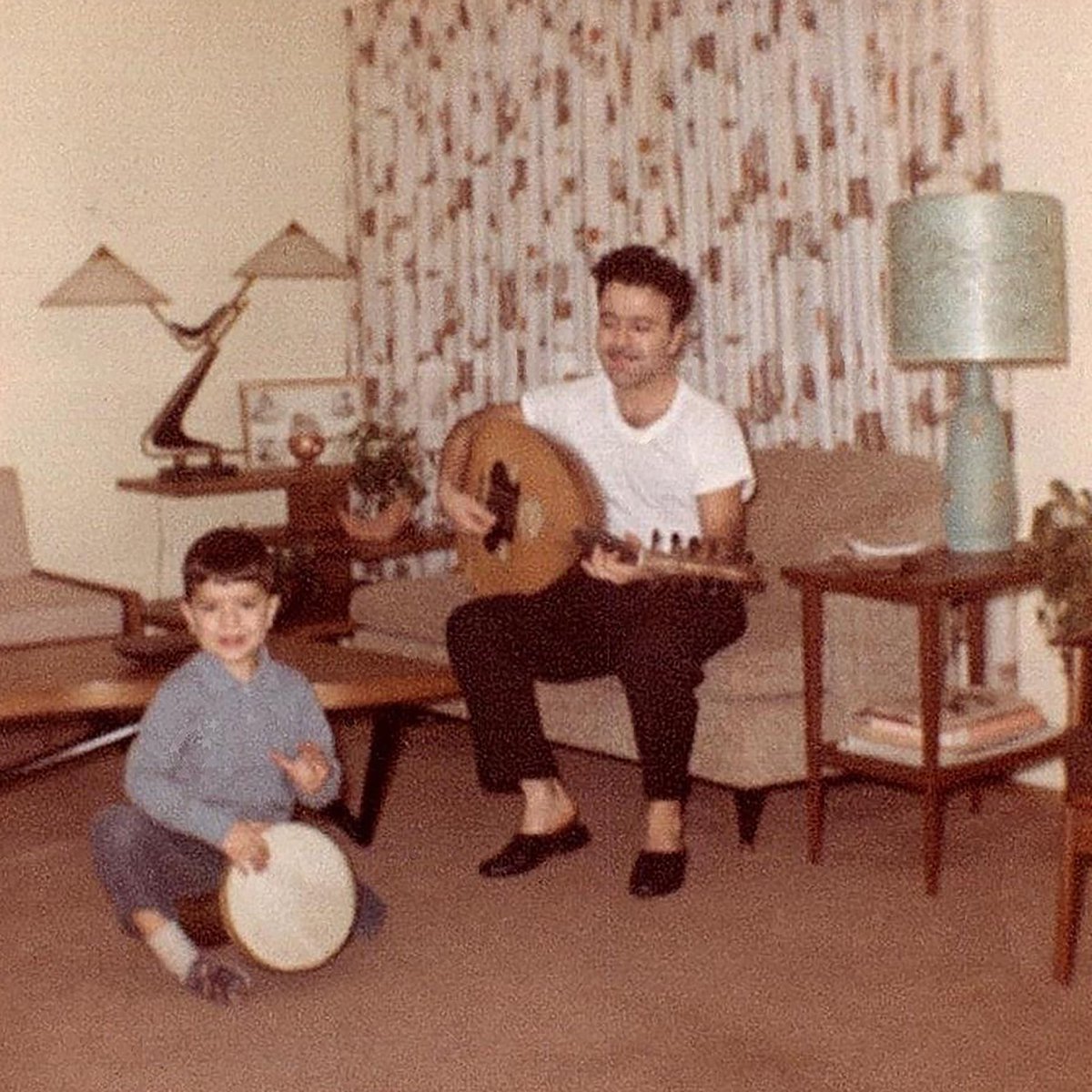 A five-year old Ara Dinkjian with his father Onnik Dinkjian performing at home, 1963

Source: The Archive of Ara Dinkjian