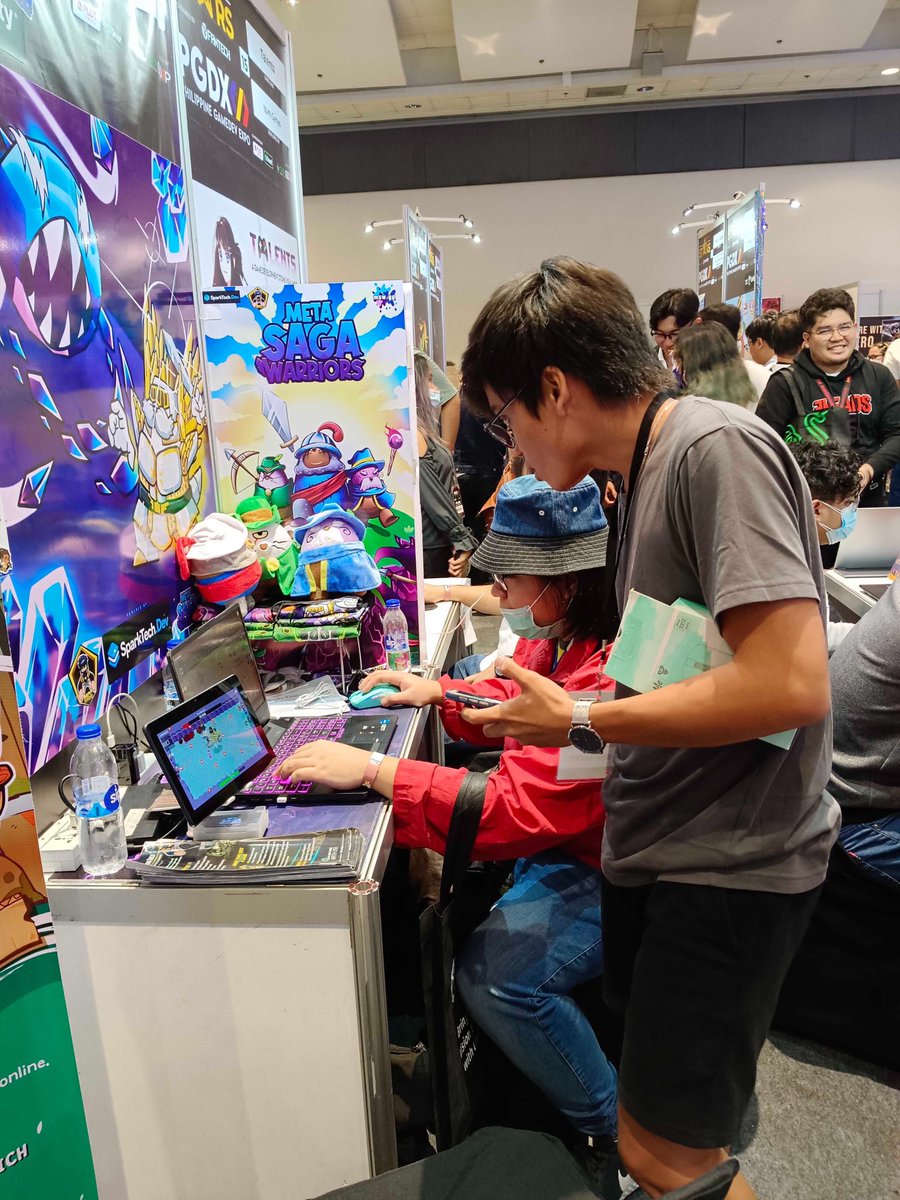 MetaGamingGuild's tweet photo. 🇵🇭 Day 2: Philippine Game Dev Expo
LOOK! The team at MGG x @metasagawarrior are having a blast at PGDX. Excited to meet you here! 😉
We’re here ‘til the tomorrow!
Visit us: Booth 16 SMX Convention Center
#IRL #IRLevent #PhilippineGameDevExpo #PGDX #GDAP #CBZN #IndieGame https://t.co/6VJnLXyhvS