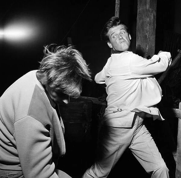 RodneyMarshall1's tweet image. Was re-watching a couple of b/w Saint episodes last night and it reminded me how good Roger was in the action sequences. For someone who was a pacifist in real life, and claimed to be clumsy, he clearly relished the fight scenes. #haymaker