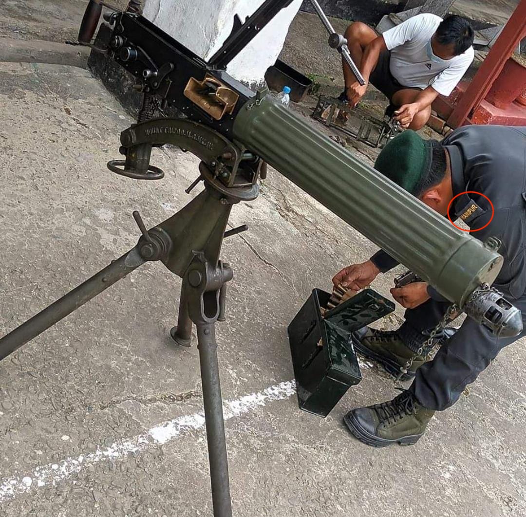 fakebuster007's tweet photo. Something to worry about for the Kuki volunteers. Meiteis are relying not just on the 5000-odd looted guns from Manipur state force's Armouries but also on firepower brought along by their radicalised militants from Myanmar. This is a sophisticated Vickers Machine Gun, something a mere untrained volunteers with single barrel cannot withstand. @Spearcorps please take cognisance.  Kukis need protection of Indians and Indian Armies.
NB: "Manipur " is clearly written on the badge of the man beside the weapon.

#ProtectKukiZo #IndianArmy #SaveKukiZo #ManipurViolence #MeiteiMilitants #

@AmitShah @narendramodi