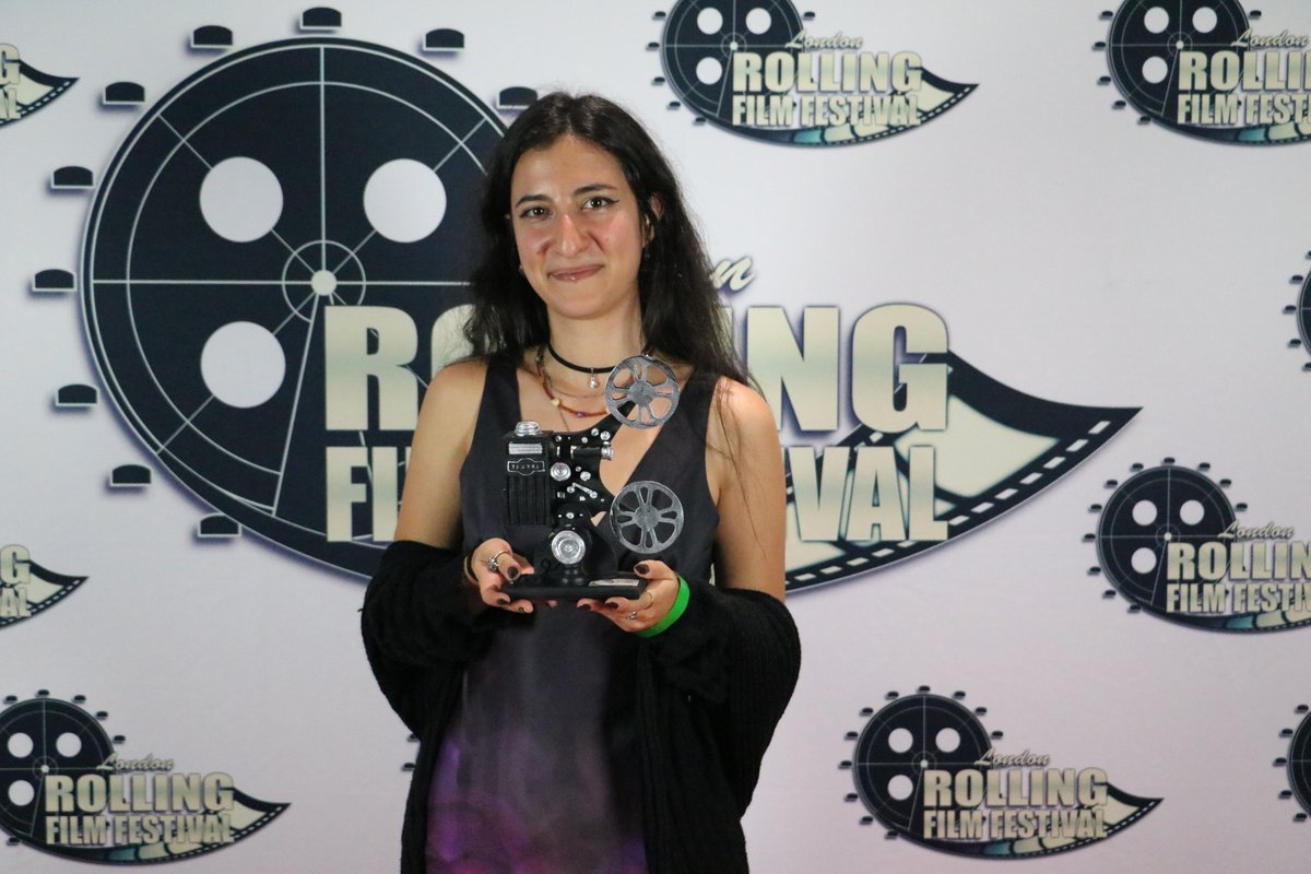 RollingFilmFest's tweet photo. π Federica Schiavello, director of "Stay Behind" on the red carpet and in the limelight for winning Best Short Film (Jury Award), complemented by accolades for Paolo Bischi's cinematography and Vicky Turner's costume design.
#LondonRollingFilmFestival #Awards #LRFF2023 https://t.co/7mWXvL7qnG