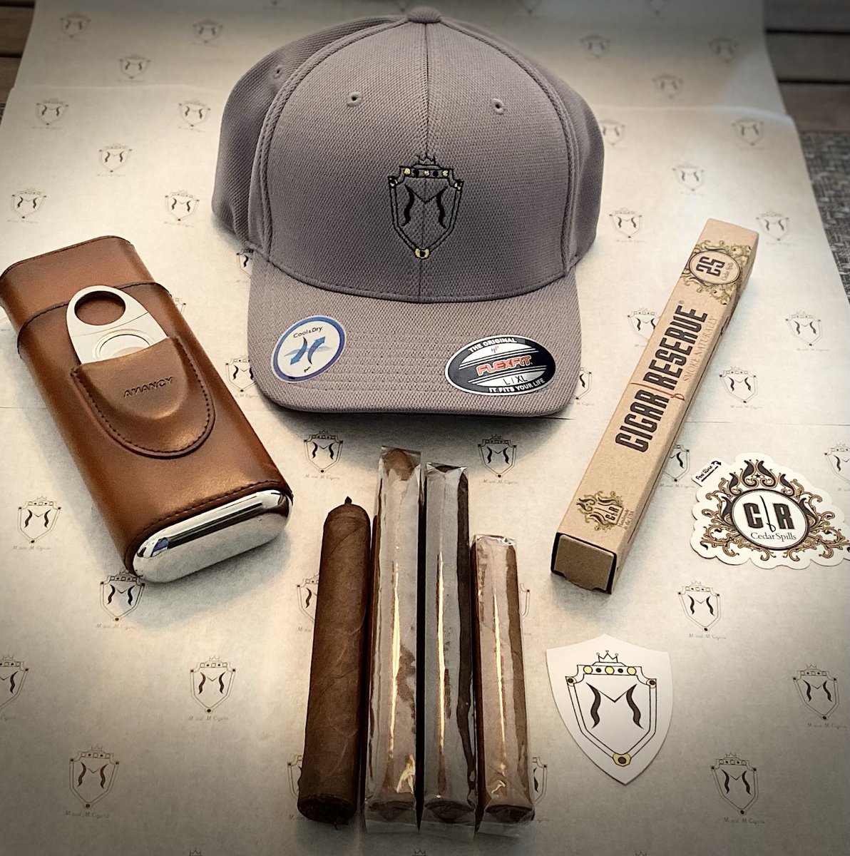 Next Giveaway!

(1) @mandmcigarco embroidered Flex Fit hat
(1) 3-cigar leather travel case with straight cutter
(1) 25-pack @CigarReserve Spanish cedar spills
(1) Private Reserve - Montevideo
(1) Everyday - Connecticut
(1) Everyday - Habano
(1) Everyday - Maduro
Assorted stickers