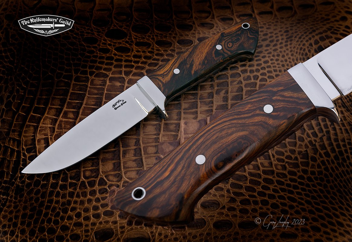 Beautiful piece of Desert Ironwood on this Loveless Drop point hunter, 4 1/4' cpm154 blade 9' oal 416 guard, taper tang available #bladewest2023 #theknifemakersguild #texasknifemakersguild