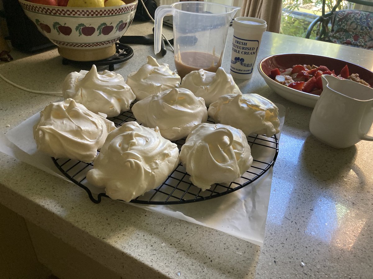 My first meringues. Not sure why they always scared me. Coulis, syrup, cream, strawberries and rhubarb ready for assembly tomorrow.