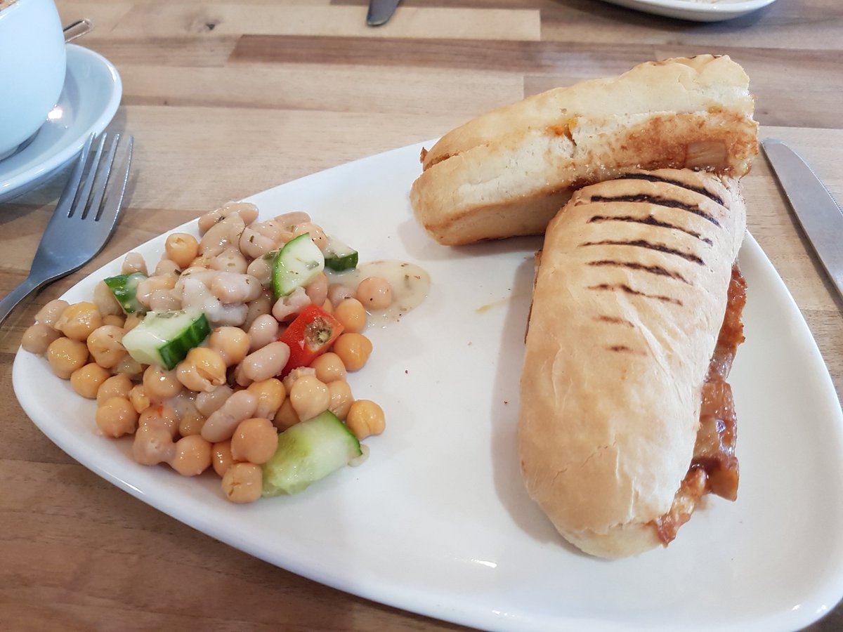 joolslox's tweet photo. The WWT recipe for side salad: mix some tinned beans and chick peas, hack off a couple of chunks of cucumber and the stalky bit of a tomato, get a male colleague to create a "dressing", serve to customer  #inedible https://t.co/Z96DOCf5f7