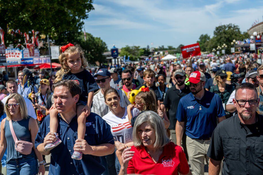 Republican presidential candidate Florida Gov. Ron DeSantis carries his daughter Madison