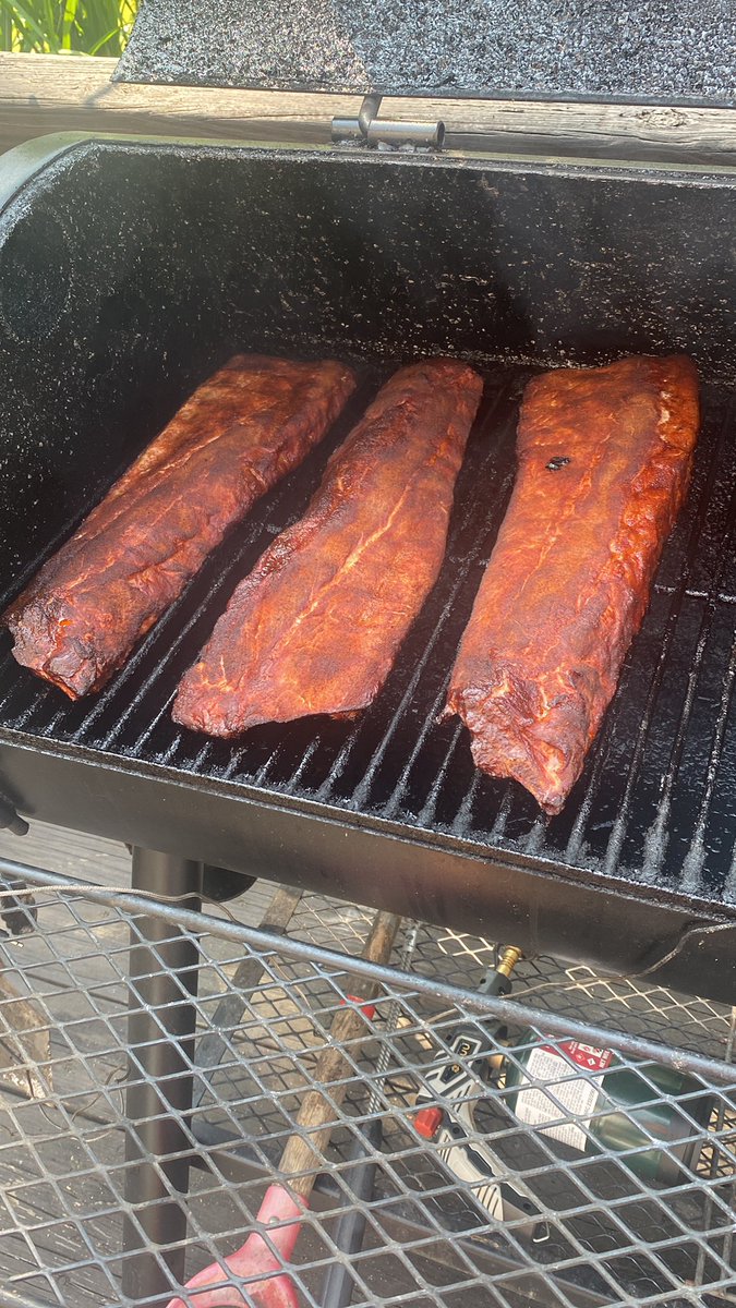 JayRheaBBQ's tweet photo. 3rd set of Baby Backs on the smoker since 5am! They are starting to get that glow! I need a bigger smoker I believe! #oklahomajoes #ribs #BBQ  #killerhogs #smokeywoods #bbcharcoal https://t.co/DenkHEFBh3