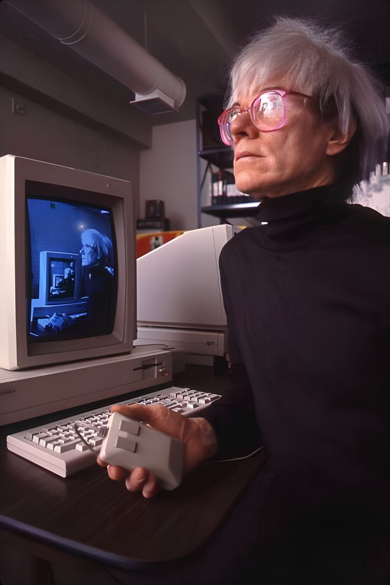 Andy Warhol back in 1985 with the Commodore Amiga 1000 . .