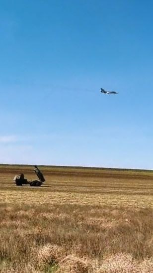 Osinttechnical's tweet photo. Eastern Ukraine, a Ukrainian Su-24M passes by an M142 HIMARS. https://t.co/M0OJi7p3pO