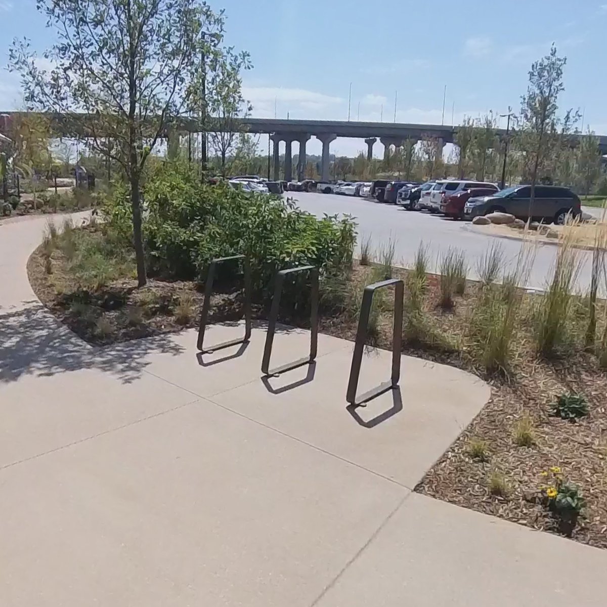 GATOmahaNE's tweet photo. The one and only set of bike racks in the new @OmahaRiverFront / Heartland of America Park area. This is located near the new parking lot just south of the @luminarium . https://t.co/qZxNymivL8
