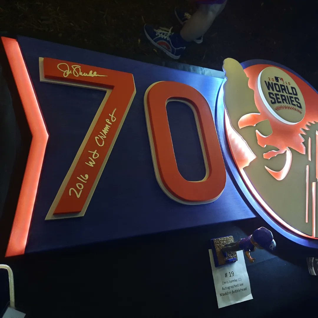 FlytheWood's tweet photo. @Club400cubscave presents, @MaddHalos to benefit @SO_Illinois! 
Very happy that the @FlytheWood Maddon piece auctioned for $1600 and Kerry Wood piece brought $2000.
#joemaddon #cubsfanshelpingcubsfans https://t.co/fKKjRpcWXY