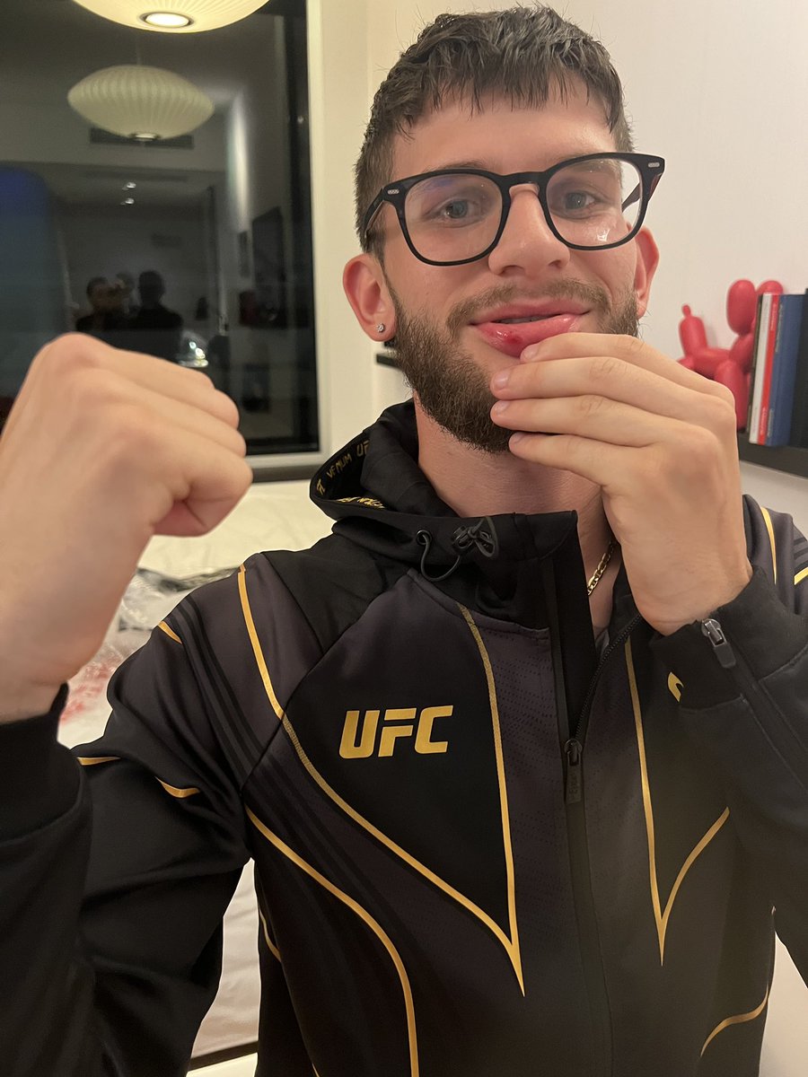 Nickcortese7's tweet photo. @SugaSeanMMA hit aljo so hard MY lip got busted up. What a night #UFC292 https://t.co/Ld5oV5RmXV