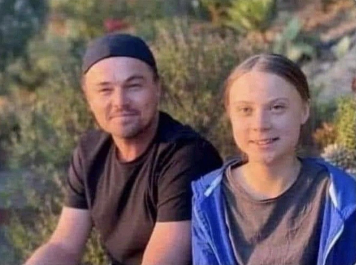 Lovely photo of one of the greatest actors of all time sitting with Leonardo DiCaprio.