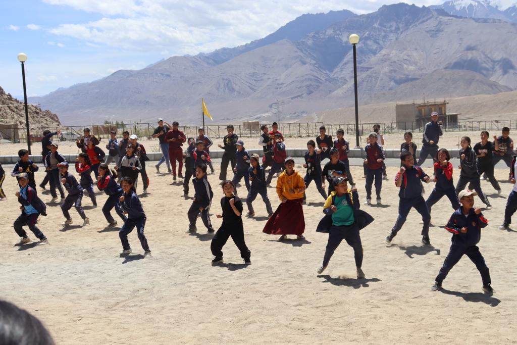 ULadakh's tweet photo. The University of Ladakh, in collaboration with Art of Living, @LAHDC_LEH, Leh and the Army, successfully concluded a 17-days summer Kung Fu camp at Leh Campus, UoL. The camp aimed to promote physical fitness, mental well-being, and cultural exchange among the participants. https://t.co/PV720kAppY