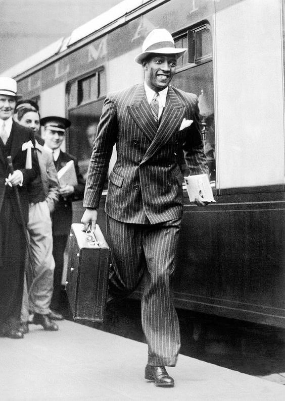 Jesse Owens in London after winning four gold medals at the 1936 Olympics.