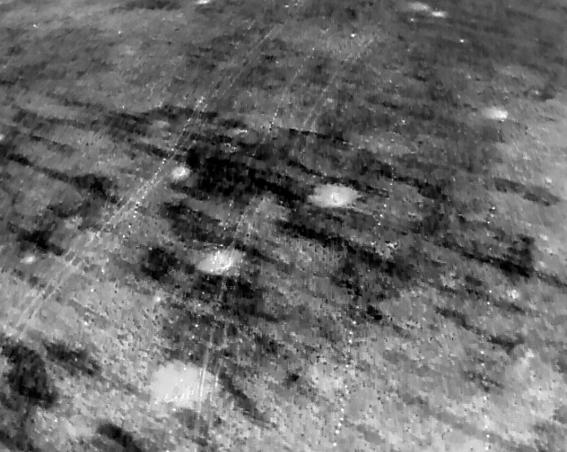 First picture is a field used for logistics of our vehicles for offensive. You can’t spot anything suspicious here

But in fact - on 2nd picture - it is a deadly 4 row mine field. 

During the day in the sunlight, mines get very hot and you can easily spot them with thermal drone