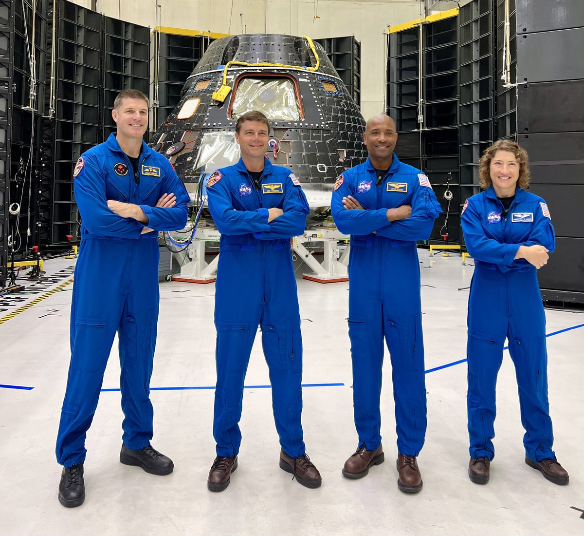 NASAKennedy's tweet photo. First look 👀: @NASA’s Artemis II crew visited Kennedy today to get their first look at the @NASA_Orion spacecraft that will fly them around the Moon! https://t.co/HwIVKQ9qQ8
