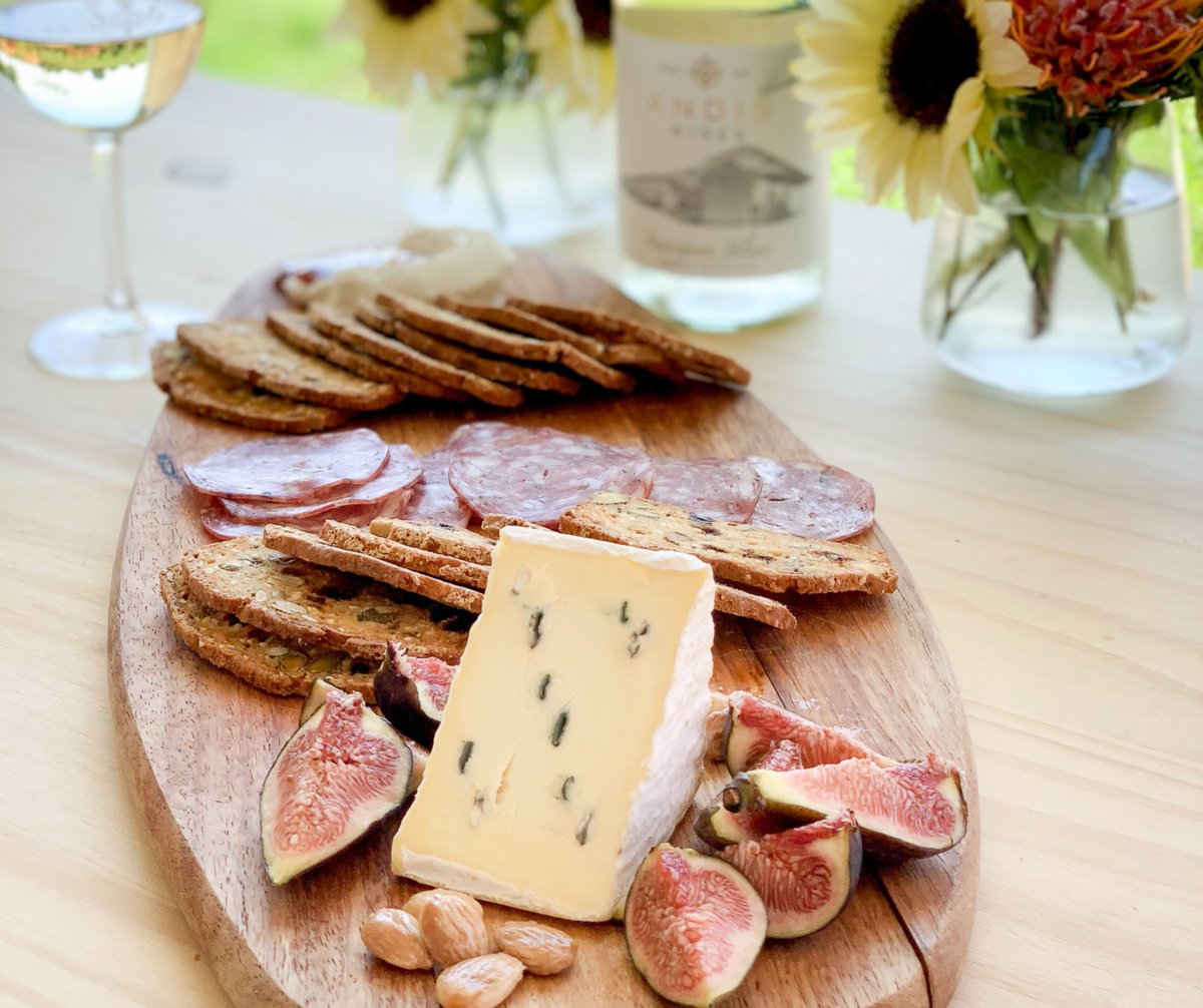 Who doesn't love a beautiful #charcuterie? Enjoy this seasonal platter through the end of August 👇

~ D'Affinois Triple Cream Bleu
~ Cypress Grove Goat Cheese
~ Sacisson Herbes de Provence (salami) Almonds
~ Apricot &amp; Pistachio Crisps
~ Seasonal Jam &amp; Fresh