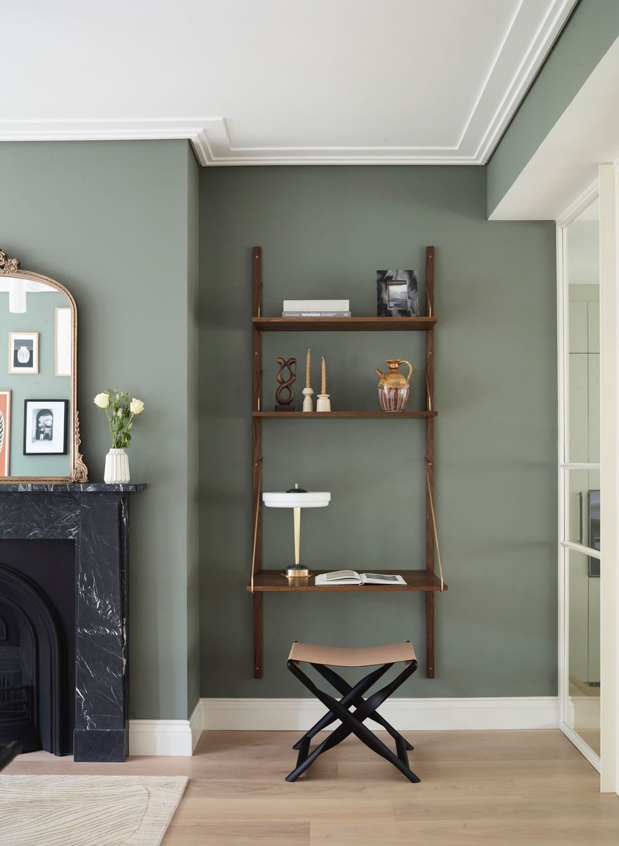 Here is a seamless and elegant solution to enclose a WFH desk in your lounge or reception area while preserving the room's aesthetics.
In our design, we take time to consider our design and select the furniture within the decor. 
Here we selected a desk that blends harmoniously w