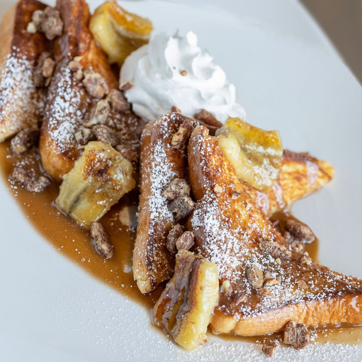 StayCafeChicago's tweet photo. Even Pancakes are Flippin' Jealous of Our Bananas Foster French Toast #brunch #Chicago https://t.co/5caIsGqLsD