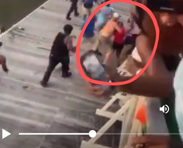 CherryCinnaMoon's tweet photo. Everyone keeps talking about the Black guy bopping the white woman on the head with the plastic chair, but what about the white guy putting a Black woman in a headlock and pulling her down?  #montgomerybrawl #MontgomeryAlabama https://t.co/erXSsMob5l