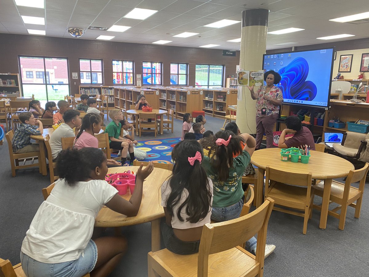 It’s the first day of school, and students at <a href="/CGETwolves/">Cedar Grove Elem.</a> are already engaged in reading at the library. Ms. Roberts is reading <a href="/DrewDaywalt/">Drew Daywalt</a>’s The Legend of Rock, Paper, Scissors to third graders and they’re already asking to borrow it after her lesson! #backtoschool 📚