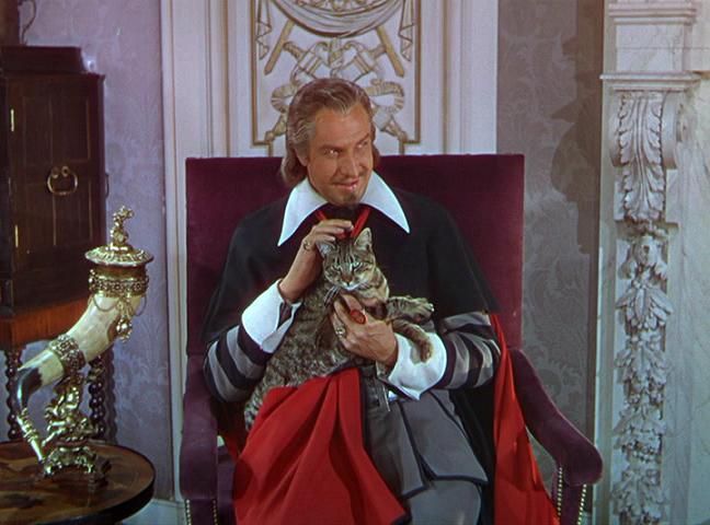 BiOrgEsp's tweet image. ¡Feliz #DíaInternacionaldelGato! ¿Quién es tu amante   de los gatos y #Bicon favorito? 

Vincent Price (#Bi2) como el cardenal Richelieu acariciando a su gato en "Los tres mosqueteros" (1948)