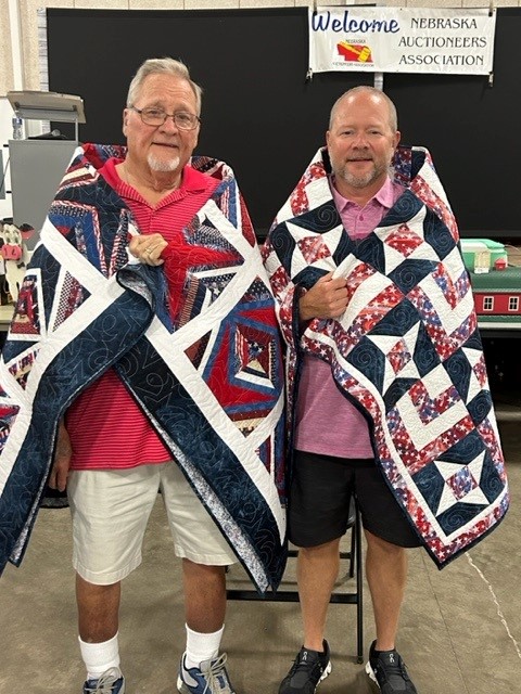 kirschtransport's tweet photo. We are proud to share that one of our own recently received a Quilt of Valor for his military service. Troy Chadwick, Chief Compliance Officer, and his Father Jerry Chadwick were honored together at the Hamilton County Fair in Aurora, NE. #Military #ArmedForces #SupportOurTroops https://t.co/er3pJJmBjY