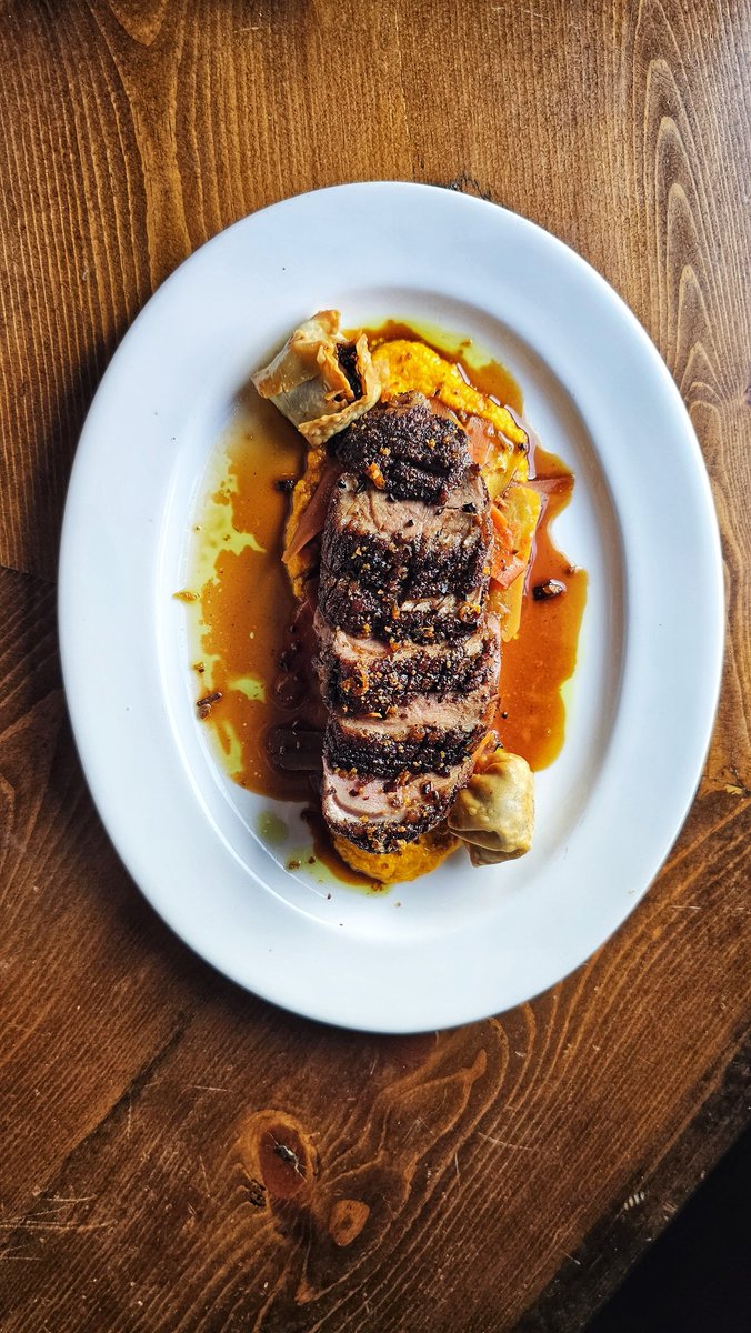 Cherrywood smoked, 5-spice rubbed duck breast, duck confit dumplings, duck skin &amp; carrot crumble, glazed carrots, carrot puree, black truffle jus