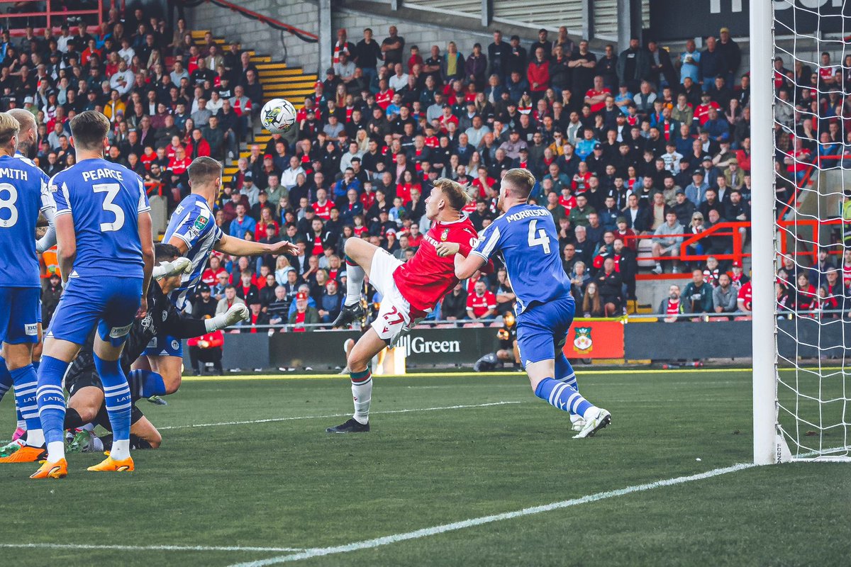 WrexhamES's tweet photo. ⏱️ Final del primer tiempo

#Wrexham 0-0 #Wigan

Bickers y McFadzean tuvieron las más claras para los Dragones y Howard metió un atajadón para evitar el 1-0 de la visita.

🔴⚪️ #WxmAFC 

🗣 #VamosDragones https://t.co/QGYrAUONcA