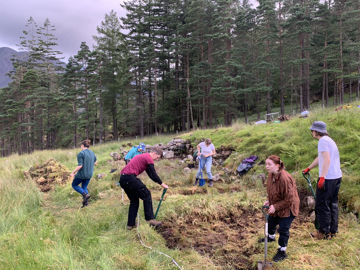 EddieCStewart's tweet photo. We’ve had another great day on site with exciting finds including a 18th c. decorated pipe bowl and the rim of a possible 16th or 17th c. face jug(?). Deturfing continues and a beautiful slab floor is emerging inside our structure! #ScotlandDigs2023 #Glencoe2023 https://t.co/mNqxEj7S5Q