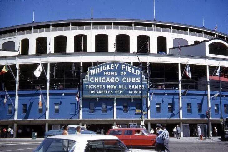 MLBcathedrals's tweet photo. The Wrigley Field marquee  in its original color. #Cubs https://t.co/GxLmlZlHp2