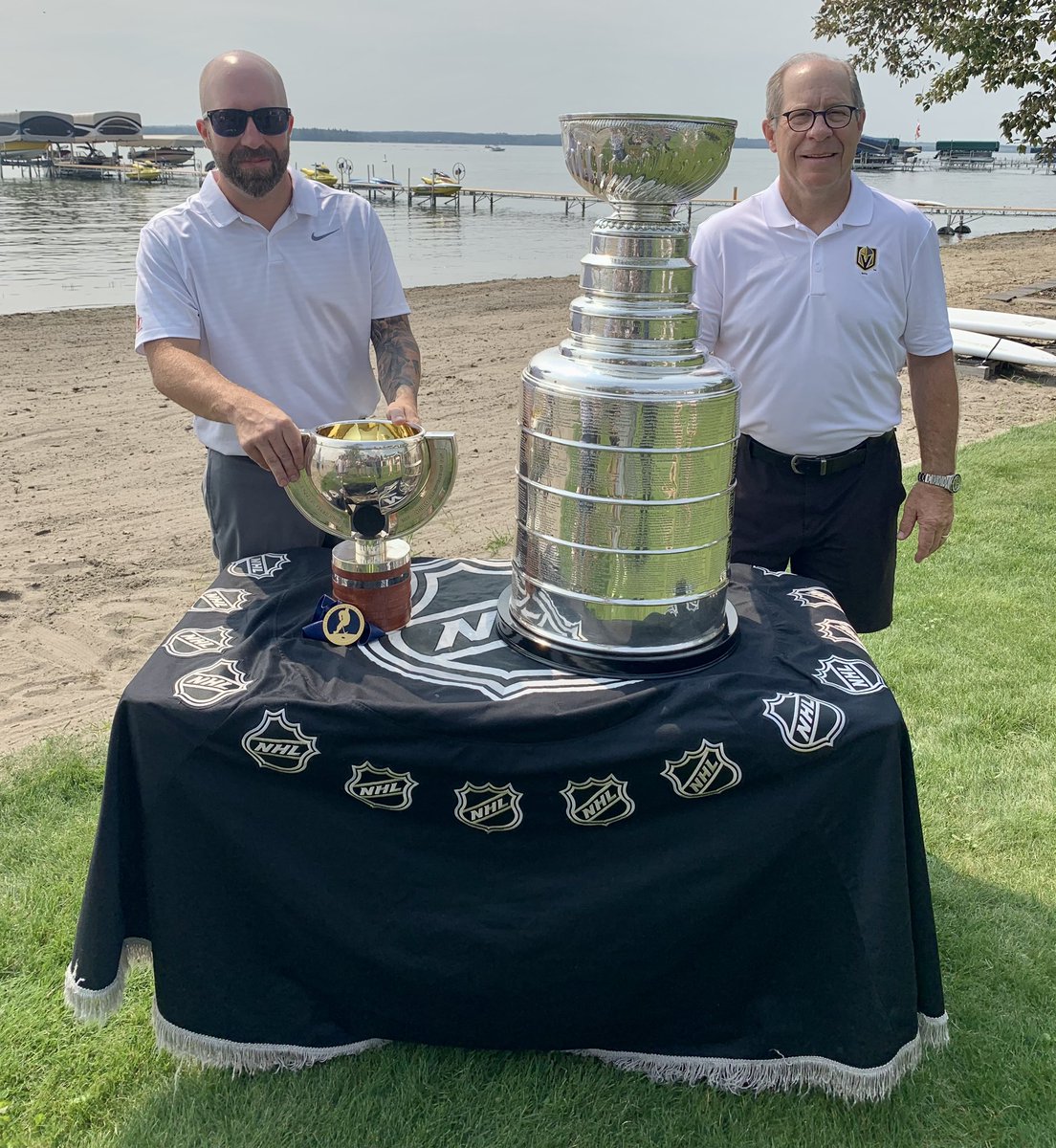 keeperofthecup's tweet photo. VGK Scout Kelly Kisio spends some quiet time with his family.  His son, Brent, brought along another great trophy that he won with Canada at the 2023 WJC as an assistant coach. (Sylvan Lake, AB) #StanleyCup @GoldenKnights @NHL @HockeyHallFame https://t.co/oOu5PDG06N