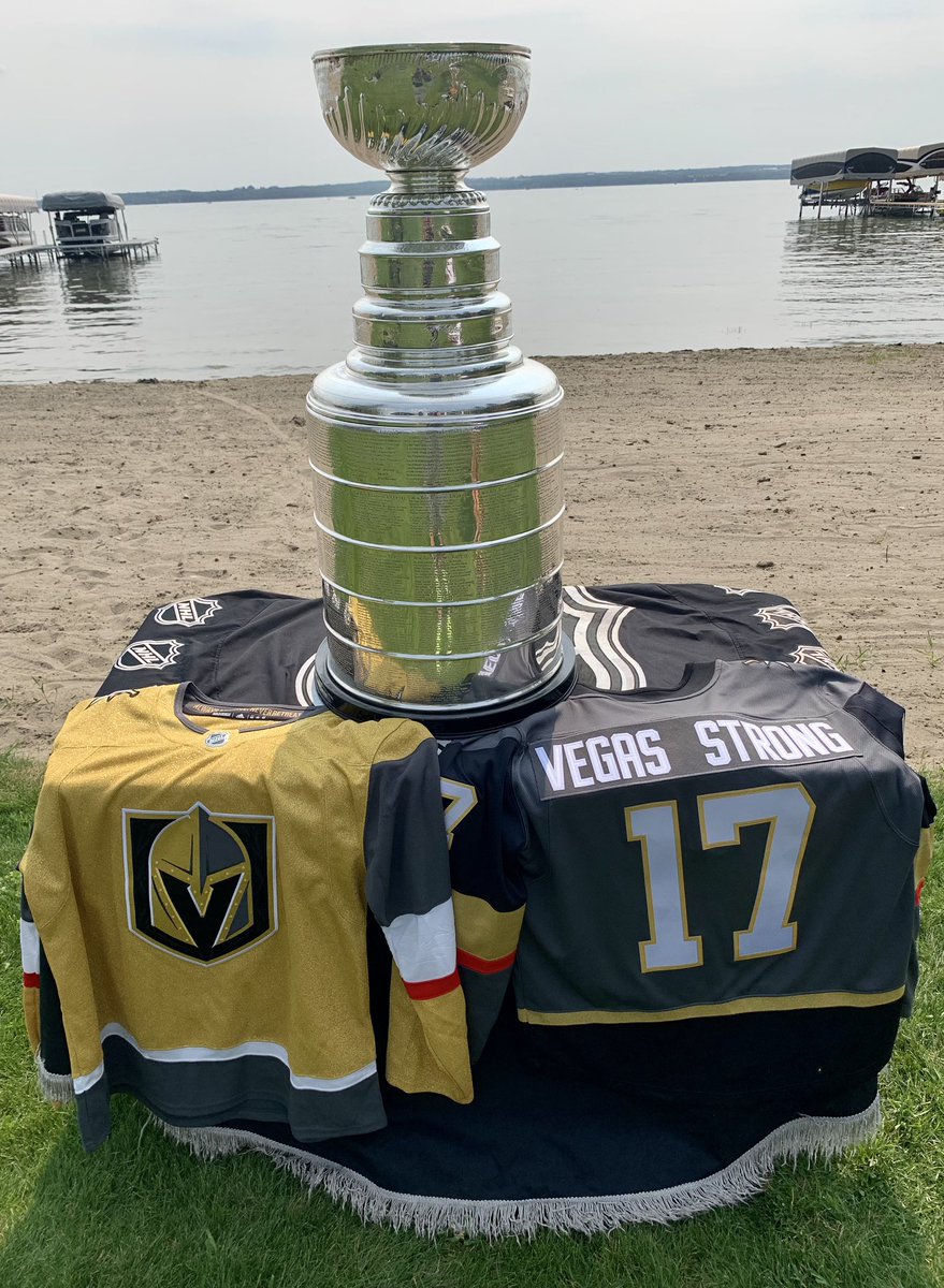 keeperofthecup's tweet photo. VGK Scout Kelly Kisio spends some quiet time with his family.  His son, Brent, brought along another great trophy that he won with Canada at the 2023 WJC as an assistant coach. (Sylvan Lake, AB) #StanleyCup @GoldenKnights @NHL @HockeyHallFame https://t.co/oOu5PDG06N