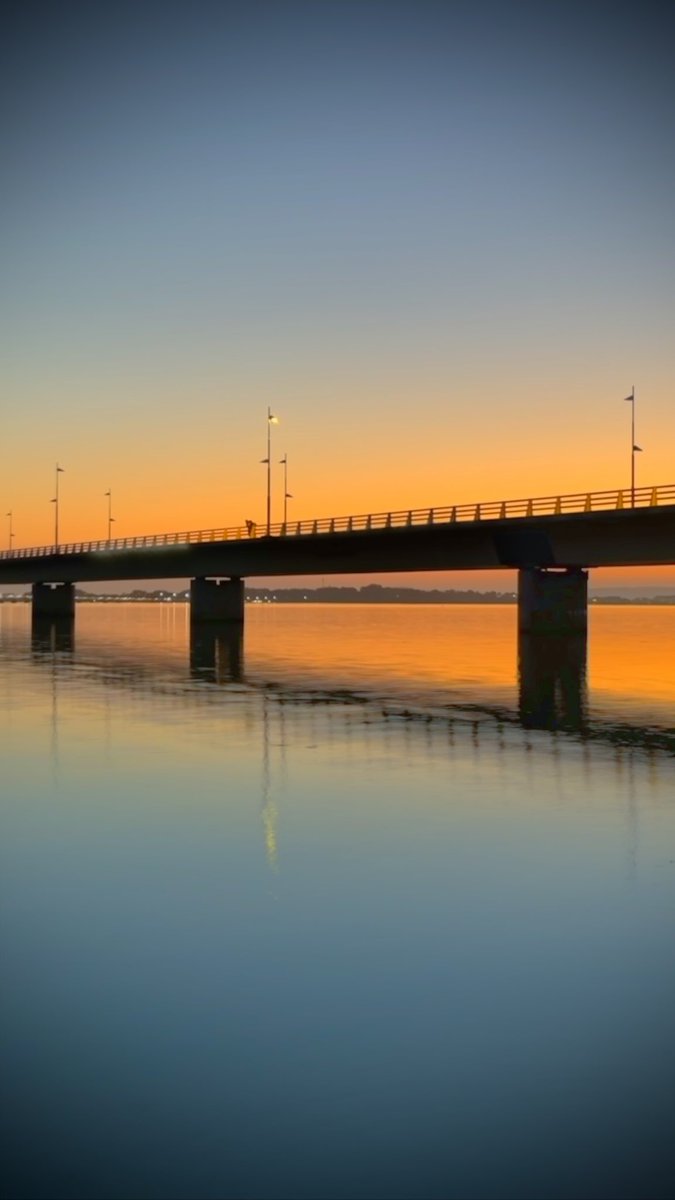 OnimPhotography's tweet photo. Puente #Sky #Tranquility #Evening #Reflection #BodyOfWater #Outdoors #Sunset #Architecture https://t.co/r5tlDBjn6B