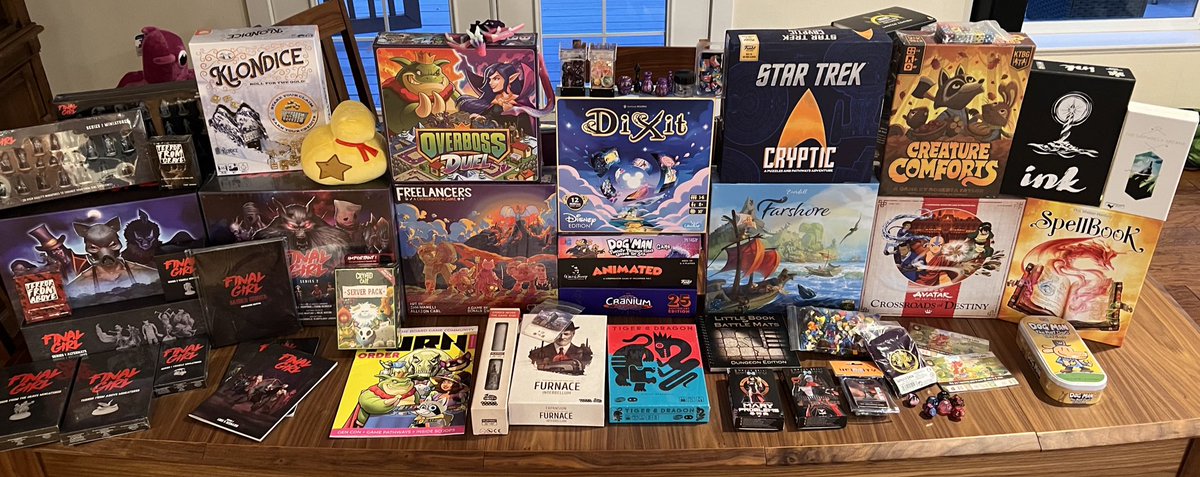 Elympian_Thomas's tweet photo. #GenConHaul time. Super excited for the Lost Ruins or Arnak expansion, Farshore, and Lost Girl! https://t.co/RpJScvevDb