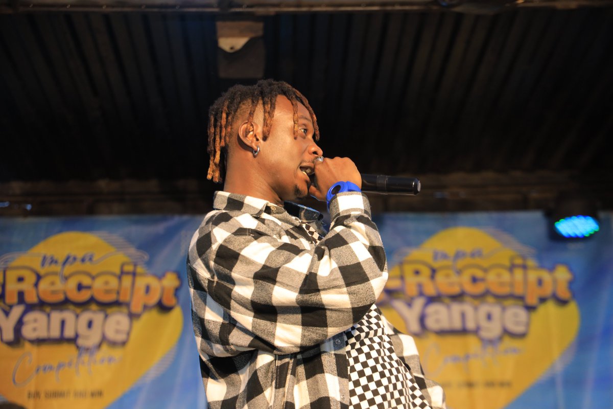 URAuganda's tweet photo. Fik Fameica and the URA Nateete Service Center, Station Head- Siminyu Charles have handed Maureen Nakandi the goods.

Maureen won herself a Samsung A12 phone.

She took this chance to shoot her shot, and asked for the Fresh Bwoy's phone number.

A gutsy winner!😉
#RubagaActivated https://t.co/MDlXDKFtlz