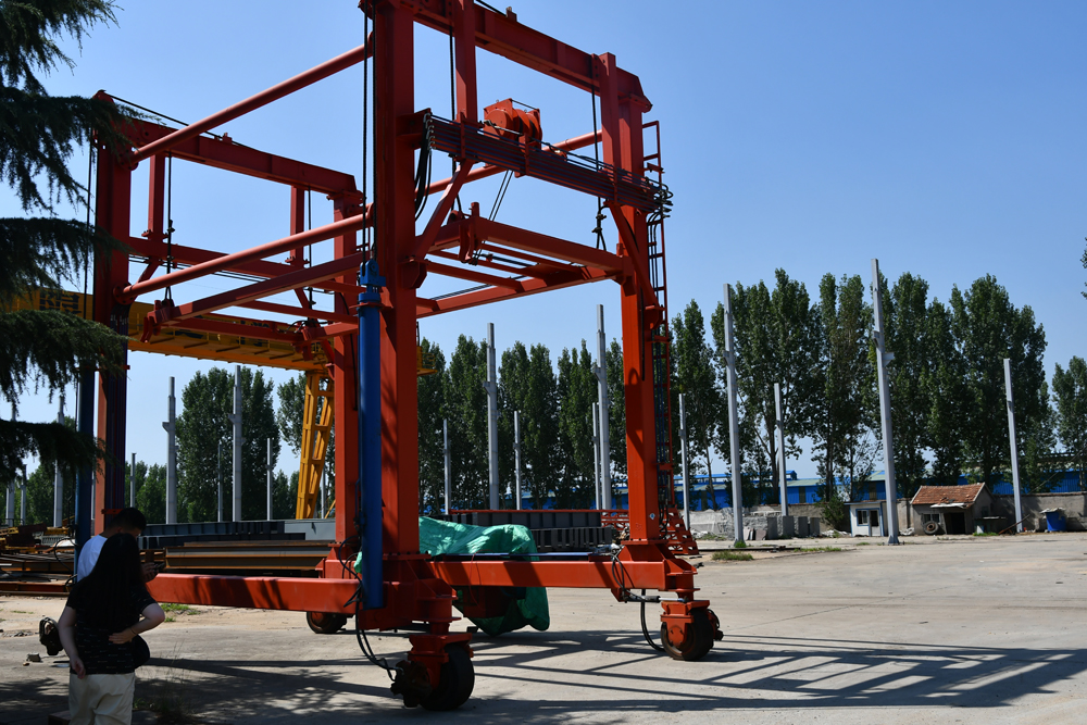 We've made one of this for container lifting.

It's smaller compared to the container crane at the dock,but it can really help for the daliy lifting of your warehouse.

#containergantrycrane