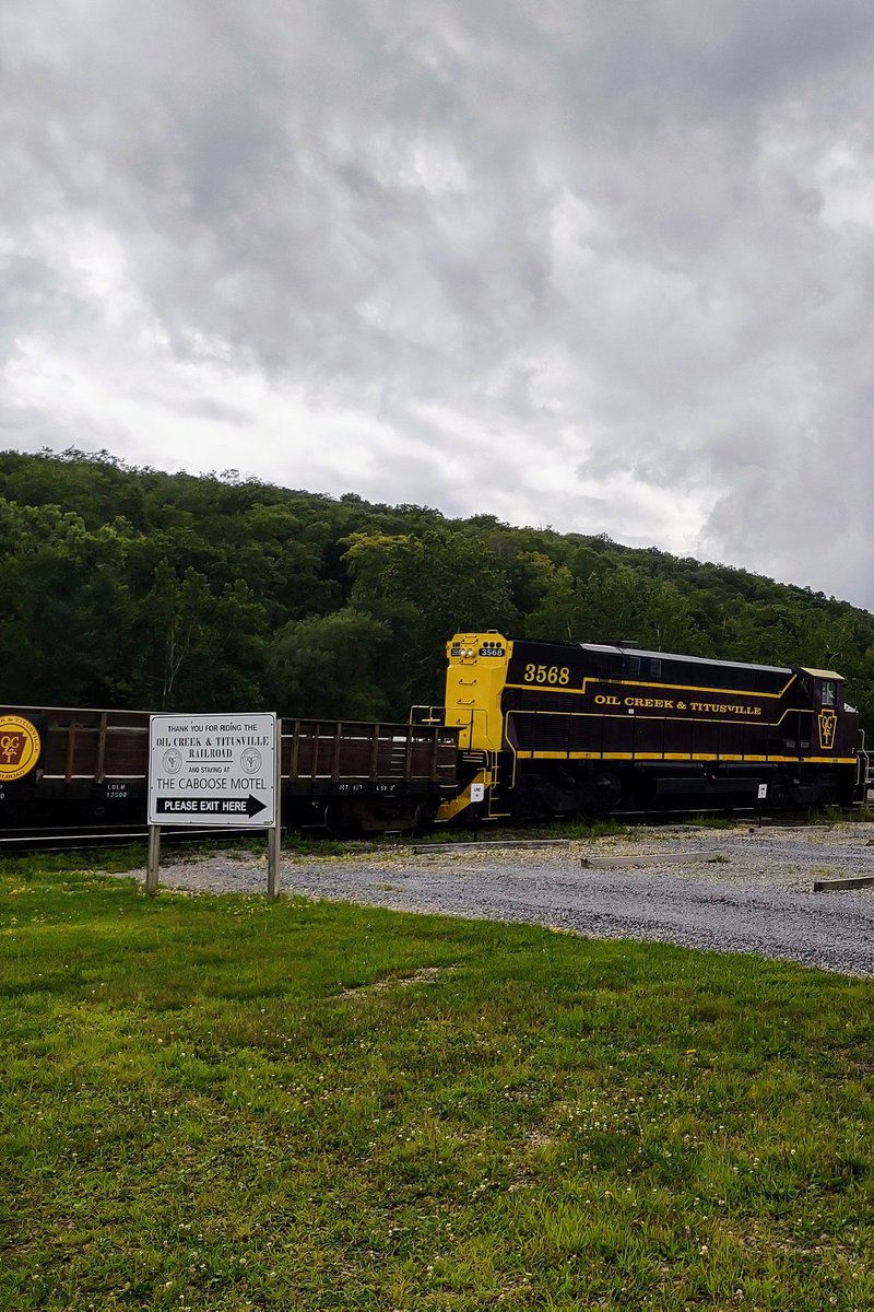 OCandT's tweet photo. Taken yesterday August 7, from in front of Caboose Motel, Inc. on my cell. Just thought the clouds in the background made for interesting pics. -JC https://t.co/KDOMYIHB9K
