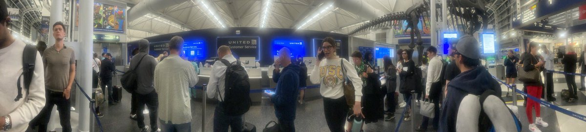 thecyberpimp's tweet photo. @united deplaned. Flight cancelled. No good reason. Two hour wait. Your staff leaving. Only two left. 75 people on line. Promises of hotels and vouchers. https://t.co/o8YOdYBfIG